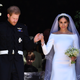 Prince Harry, Duke of Sussex, and his wife, Meghan, Duchess of Sussex, leave from the West Door of St. George’s Chapel, Windsor Castle, on May 19, 2018, in Windsor, England.